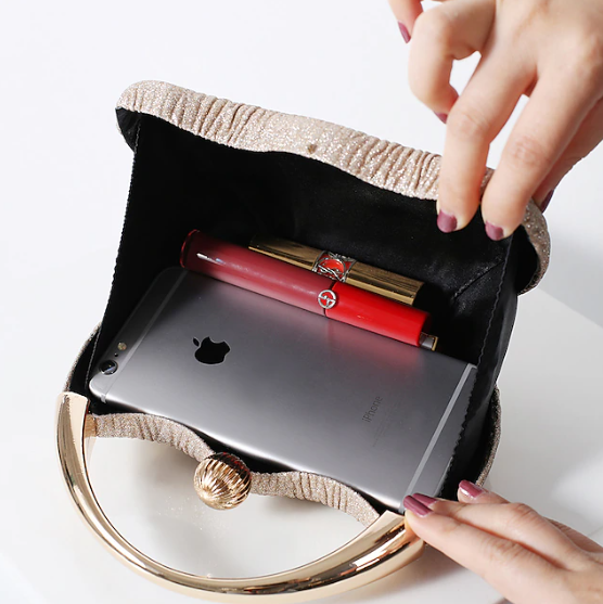 Elegant Handbag with Luxury Round Handle and Spacious Interior