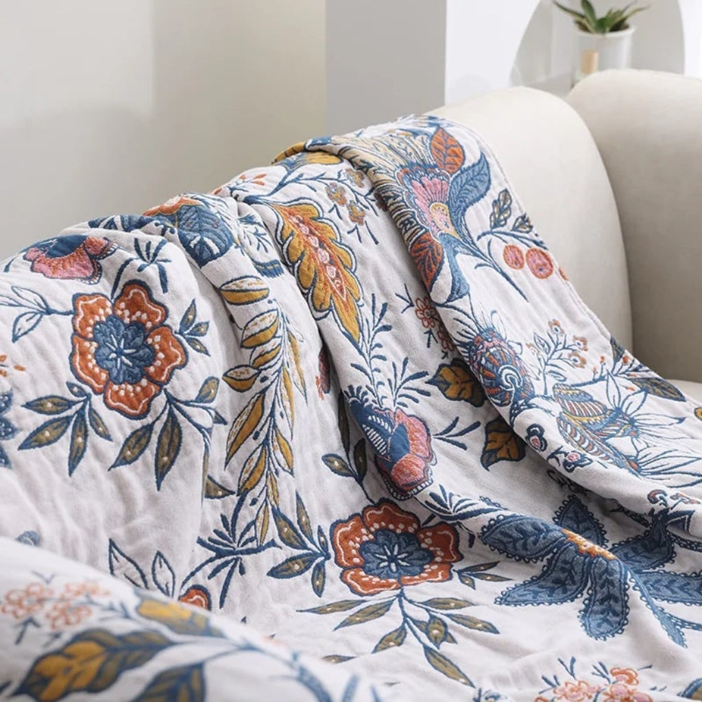 Boho-bomuldstæppe med blomstermotiv og frynsekanter