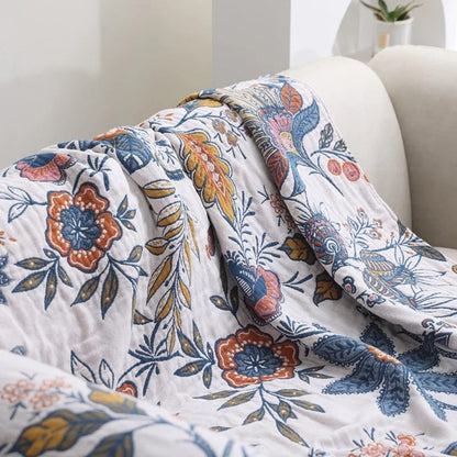 Boho-bomuldstæppe med blomstermotiv og frynsekanter