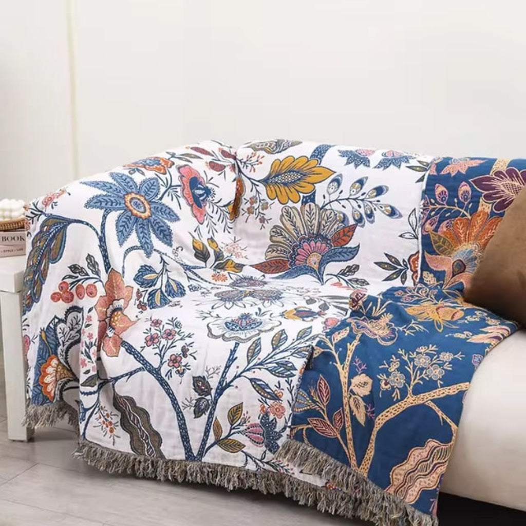 Boho-bomuldstæppe med blomstermotiv og frynsekanter