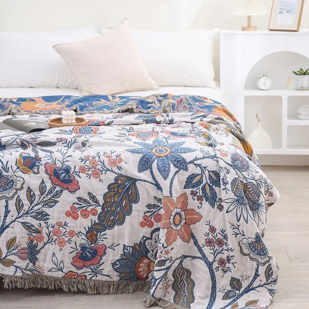 Boho-bomuldstæppe med blomstermotiv og frynsekanter