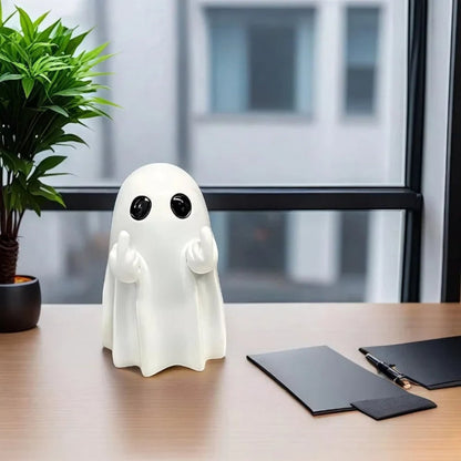 Spøgelsesfigur til bordet til Halloween med hænder, der viser langfingeren