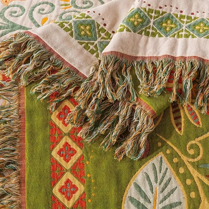 Vendbart boho-sofa- og sengetæppe med efterårsbladmønster