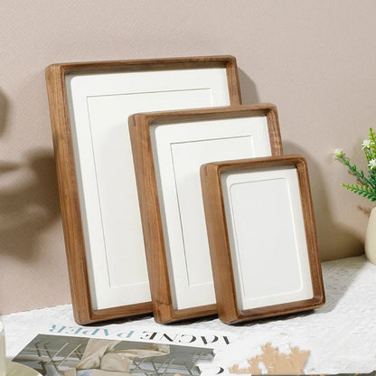 Rund træfotoramme med minimalistisk design til væg eller bord