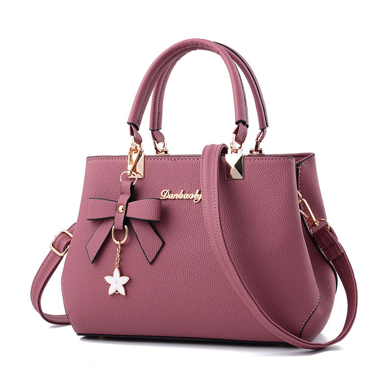 Women Shoulder Bag with Star Charm Bow Detail Soft Handle Modern Structured Handbag