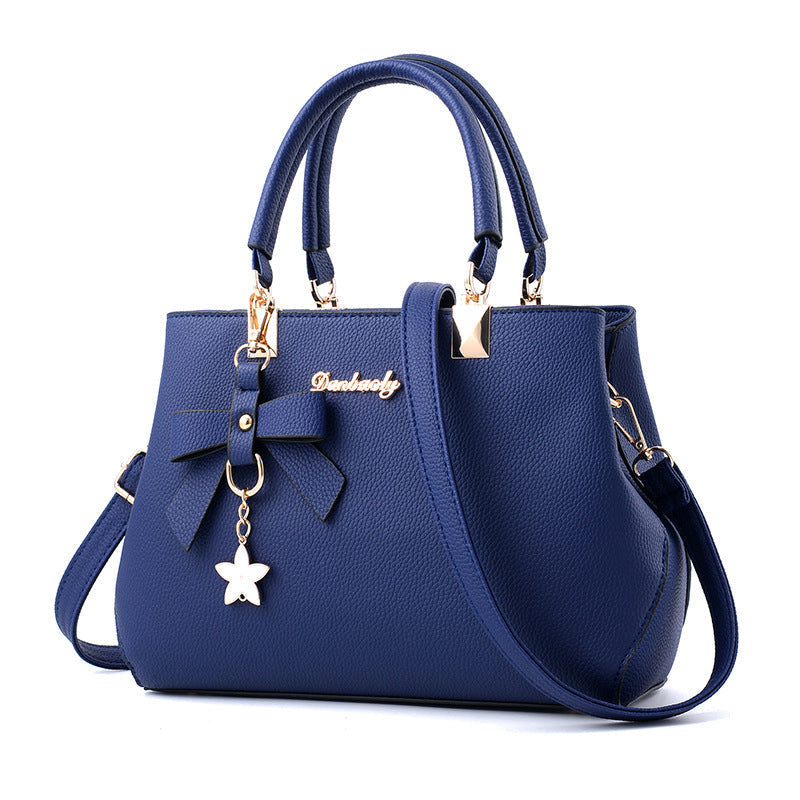 Women Shoulder Bag with Star Charm Bow Detail Soft Handle Modern Structured Handbag