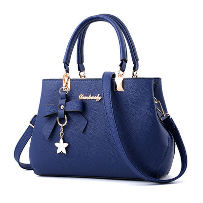 Women Shoulder Bag with Star Charm Bow Detail Soft Handle Modern Structured Handbag