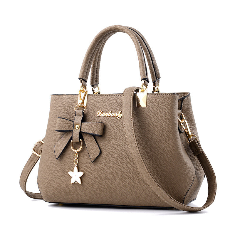 Women Shoulder Bag with Star Charm Bow Detail Soft Handle Modern Structured Handbag