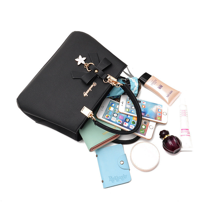 Women Shoulder Bag with Star Charm Bow Detail Soft Handle Modern Structured Handbag
